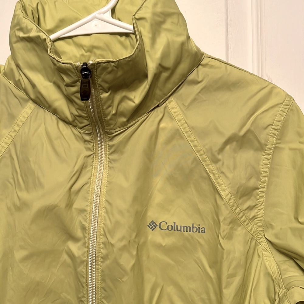 Columbia waterproof neon yellow jacket with built in hoodie. Size L
